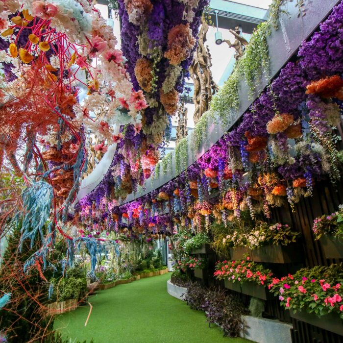 Floral Fantasy exhibit at Gardens by the Bay, showcasing vibrant floral displays and whimsical landscapes.