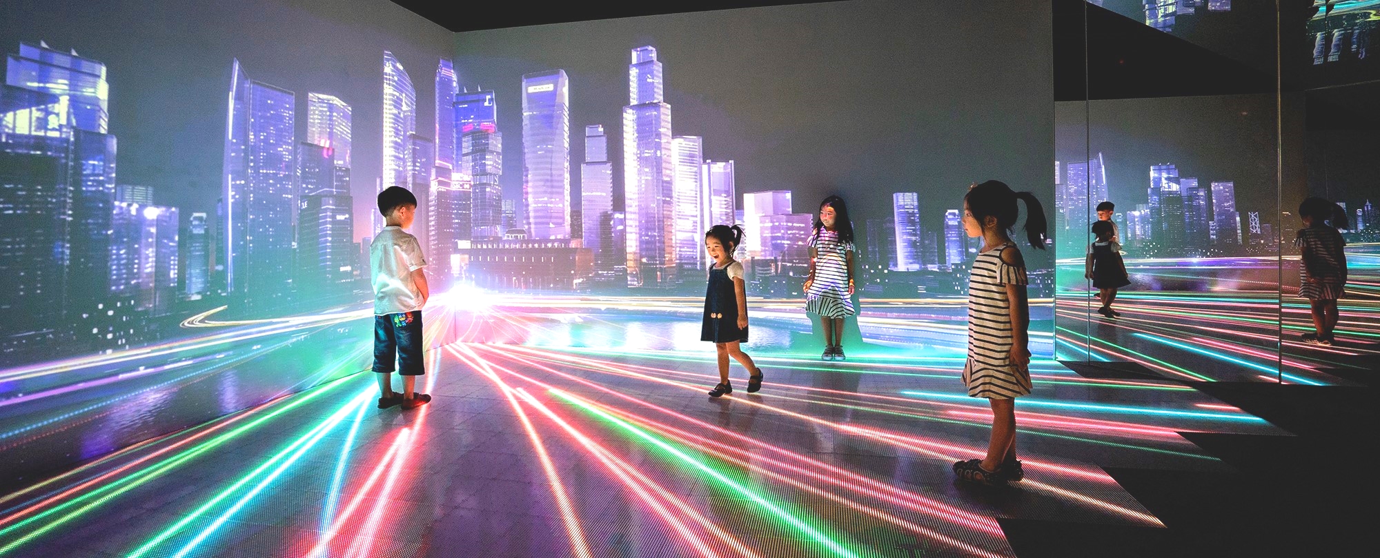 Children experiencing a virtual reality exhibit at Singapore City Gallery, displaying the future vision of Singapore as a smart city