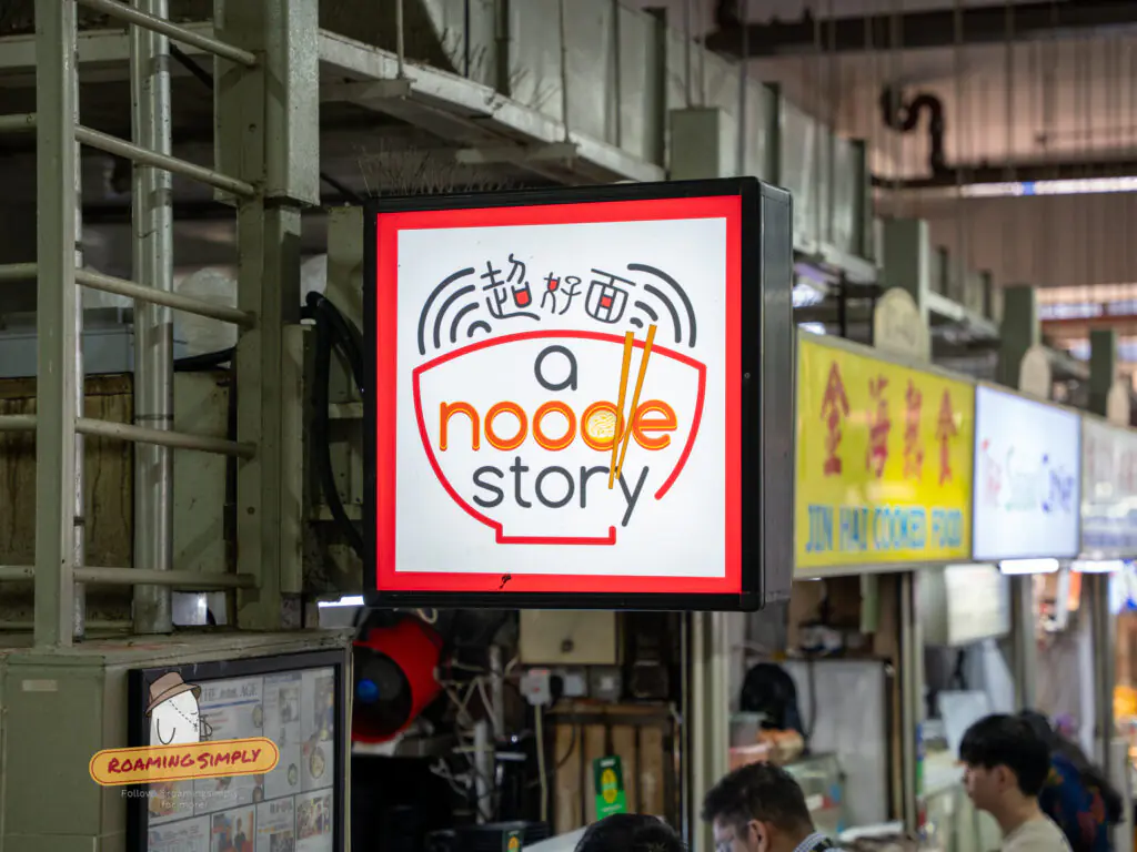 A Noodle Story stall sign at Amoy Street Food Centre, Singapore Michelin Bib Gourmand food guide.