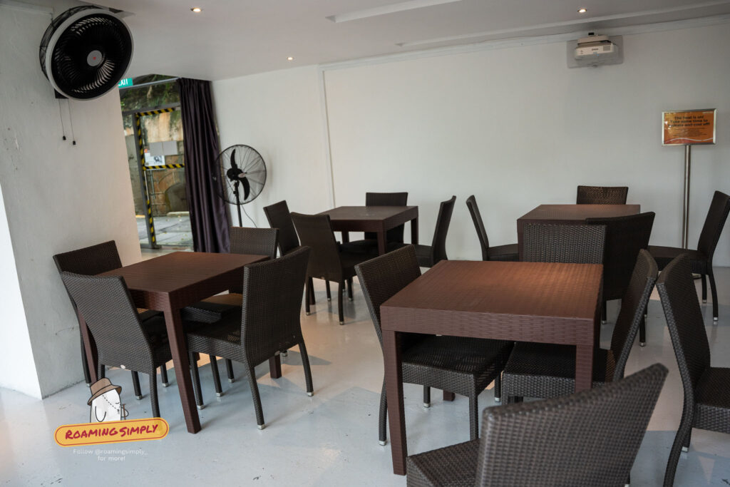 Rest area with fans and seating at Fort Siloso Surrender Chambers ground floor Sentosa Singapore