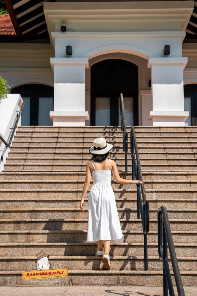 Woman climbing the granite steps to Raffles House at Fort Canning Park, Singapore
Title: The Steps to Raffles House