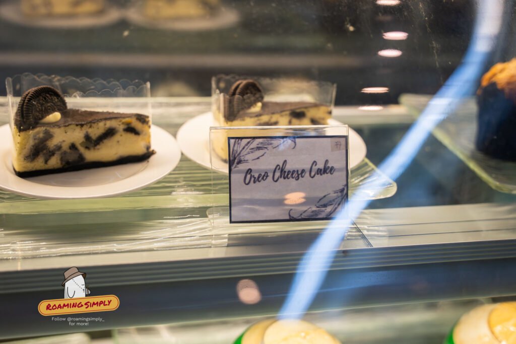 Oreo cheesecake slice on display in the chiller at Fusion Spoon, Singapore Botanic Garden