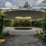 Circular water feature with hanging plants at the Sunken Garden, Jurong Lake Gardens Singapore