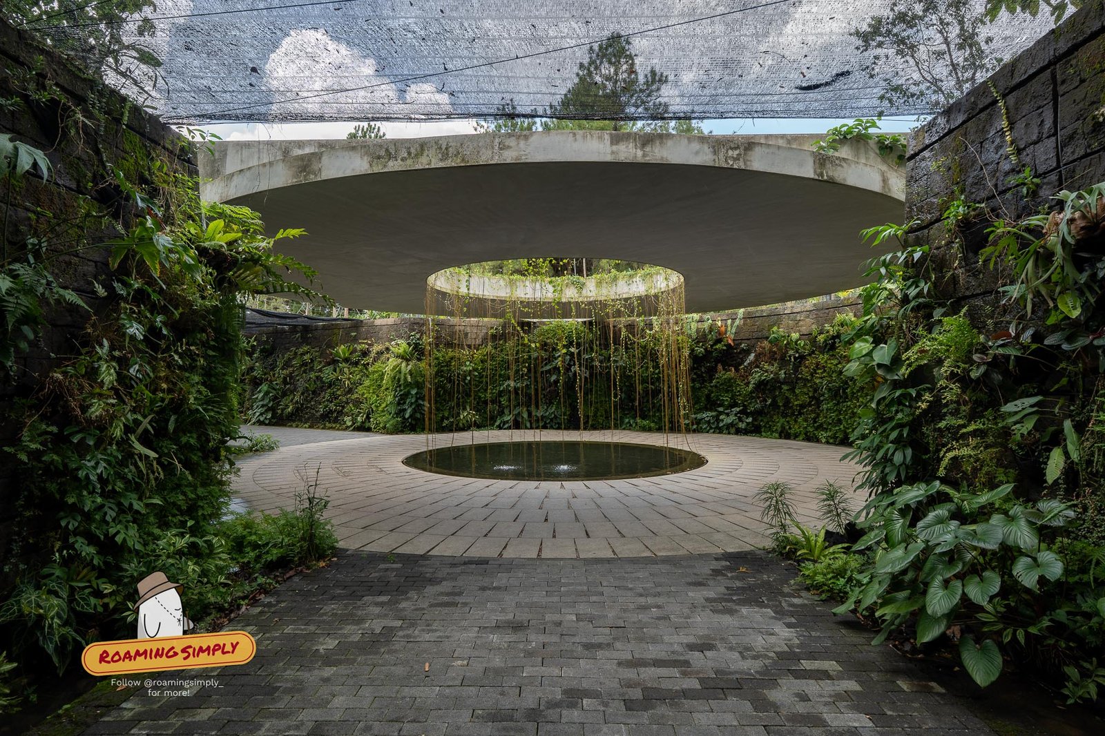 Circular water feature with hanging plants at the Sunken Garden, Jurong Lake Gardens Singapore